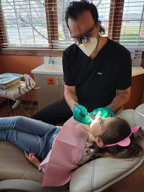 Doctor with smiling child patient